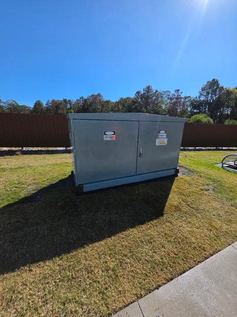 After graffiti removal: the front of the same metal utility cabinet in Kingscliff with the markings removed