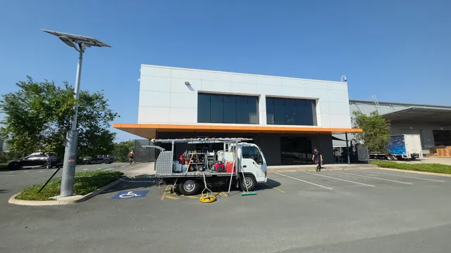 UP 2 Cleaning truck and crew outside the SIMTECH warehouse in Yatala during exterior cleaning